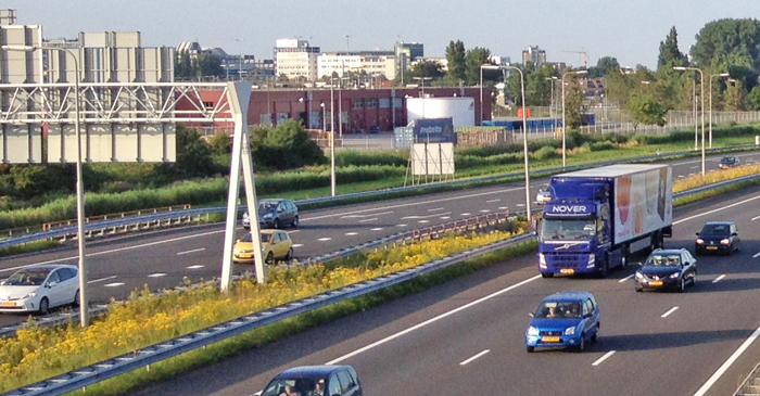 cars trucks on freeway in The Hague Netherlands