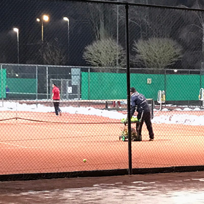 snow on tennis court in Netherlands